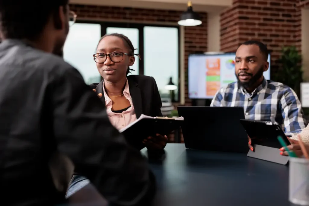 colleagues-team-working-company-paperwork-doig-teamwork-analyze-documents-online-research-information-planning-corporate-presentation-with-data-charts-job-collaboration-opt